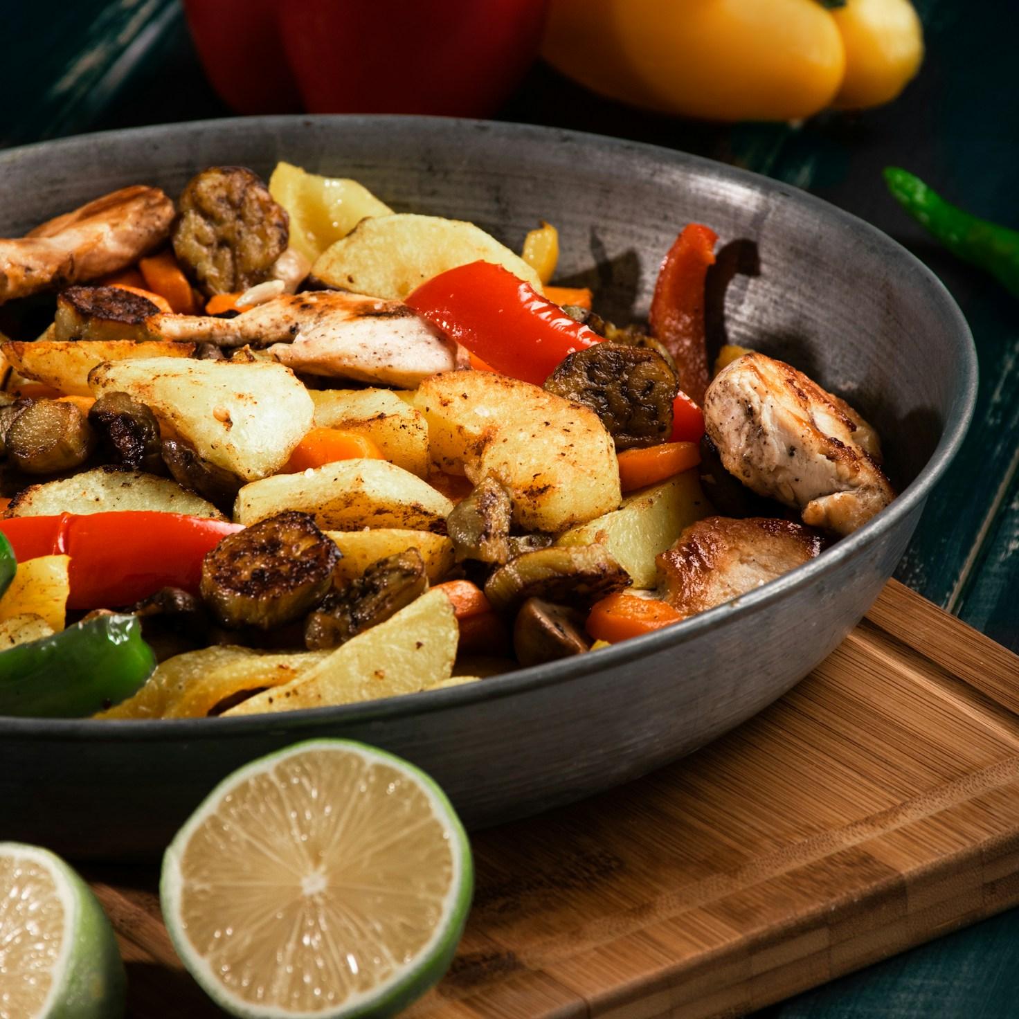 Community members collaborating in a modern kitchen space, sharing recipes and cooking techniques